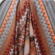 Au mètre Tissu fin jersey viscose orange ethnique en 150cm 979