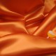 au mètre Satin de polyester opaque orange en 140 cm 971