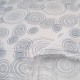 Au mètre coton froissé à spirales en gris et bleu sur fond blanc n°10117
