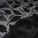 Au mètre dévoré polyester polyamide noir en 145cm avec feuilles en relief en velours n°10346