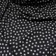 Au mètre voile viscose polyester noir à petits motifs type grain de café en 150cm n°10574