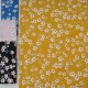 Tissu Coton cretonne imprimé Fleur d'Amandier moutarde en 150cm