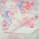 Coupon maille polyester et Lycra fond blanc à fleur rose et mauve 2m40 en 150cm