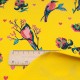 Tissu sweat French Terry jaune imprimé oiseaux rose en 145cm n°10719