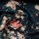 Au mètre laine bouillie noire motif floral incrusté en 145cm n°10731