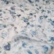Au mètre Polycoton froissé permanent fond blanc, fleurette bleue en 140cm n°10757
