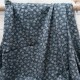 Tissu Coton fond bleu marine fleur ocre et ciel en 150cm n°10958