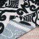 Tissu Viscose souple motif ethnique en noir et blanc en 145cm n°10960