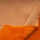 Au mètre sweat molleton envers doudou orange en 150cm n°11010